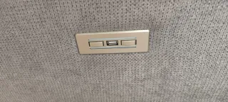 Sofá eléctrico tela gris seminuevo