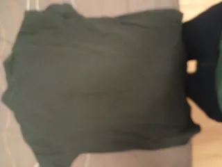 Polo del Sporting de Gijon de color negro