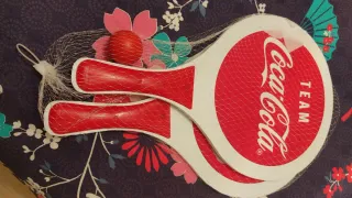 Raquetas Coca cola y pelota