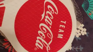 Raquetas Coca cola y pelota