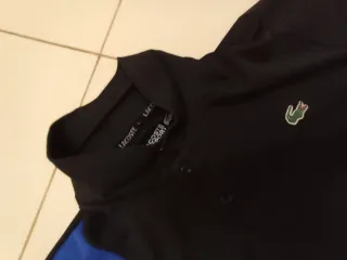 Polo Lacoste Negro y Azul