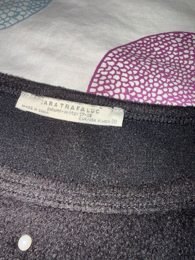 Jersey negro con perlas