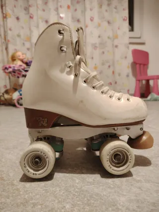 Pattini a rotelle professionali bianchi