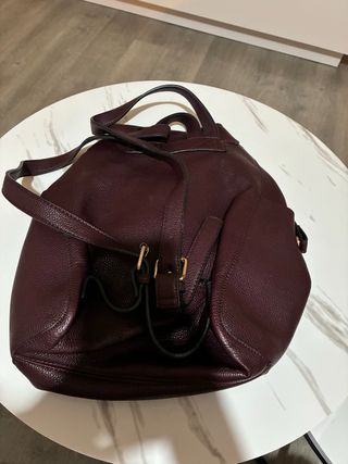 Mochila burdeos en buen estado