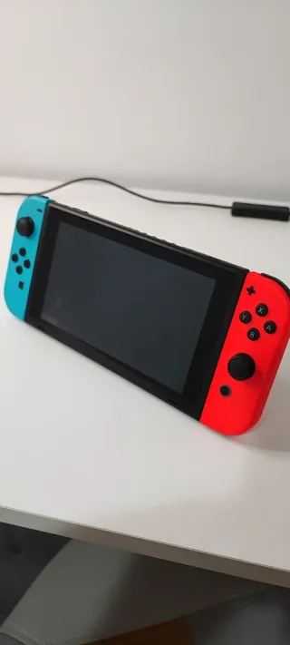 Nintendo Switch Estándar Azul y Naranja