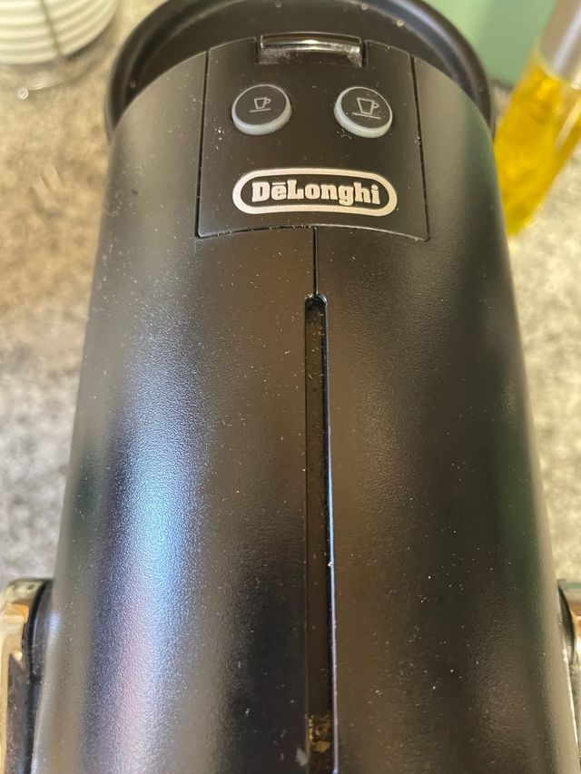 Cafetera DeLonghi Cápsulas + Pack Cápsulas