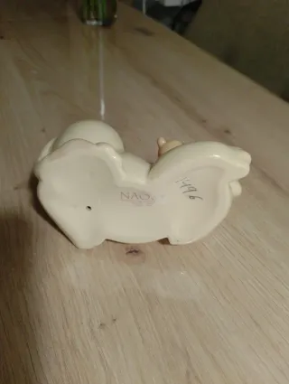 Nao Mamá Leona con cachorro