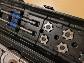 Maleta pesas 1 barra 2 mancuernas discos