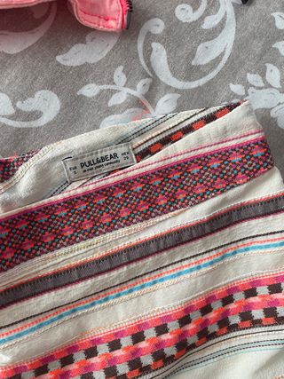 Conjunto de minifalda y chaqueta vaquera rosa