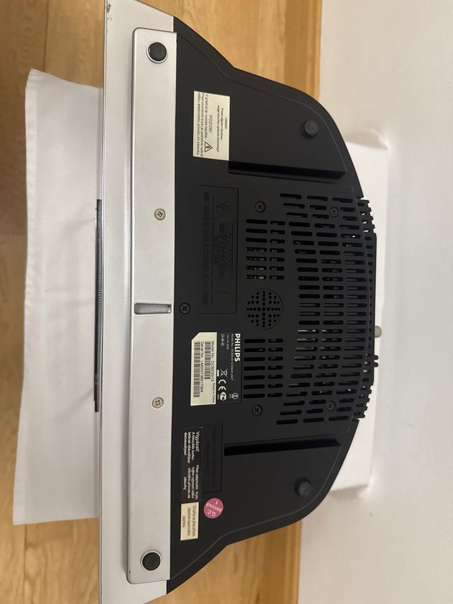 Reproductor Philips DCM230 con mando y adaptadores