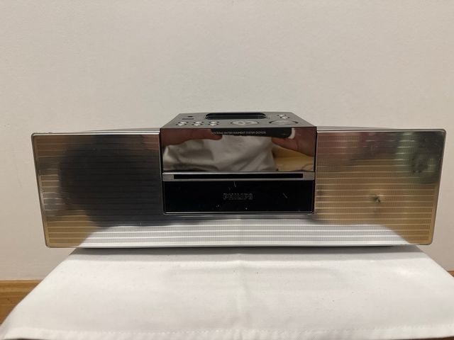 Reproductor Philips DCM230 con mando y adaptadores