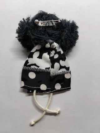 Broche niña con bolso