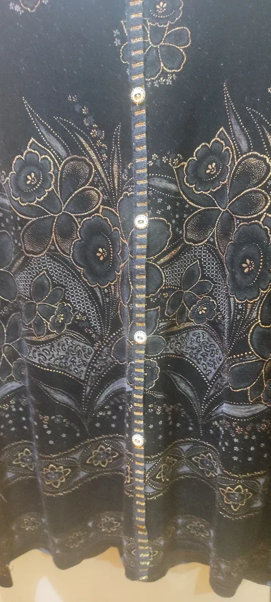 Jersey sedoso de mujer negro y dorado