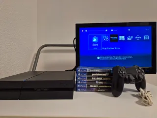 Consola PS4 + mando + 6 Juegos
