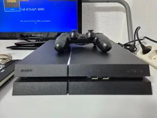 Consola PS4 + mando + 6 Juegos