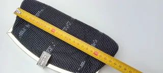 Bolso fiesta negro con broche de brillantes