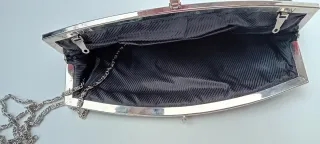 Bolso fiesta negro con broche de brillantes