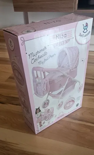 Cochecito de muñecas rosa