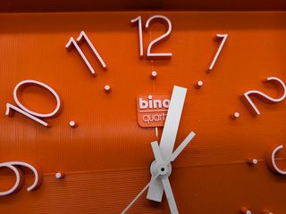 Orologio vintage Bino Quartz arancione anni '70