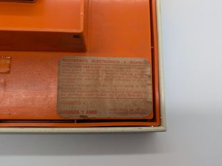 Orologio vintage Bino Quartz arancione anni '70