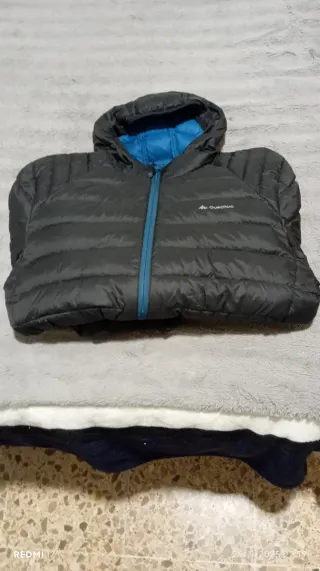 Plumífero marca quechua