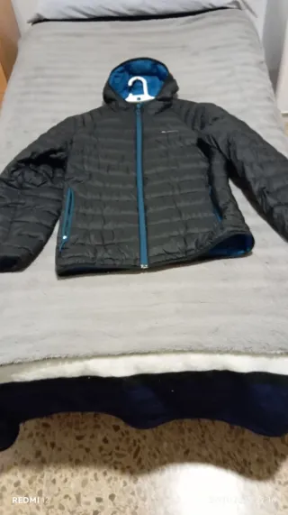 Plumífero marca quechua