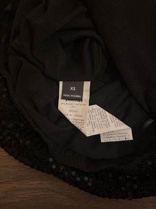 Top banda lentejuelas negro