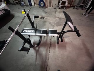 máquina de gimnasio + pesos