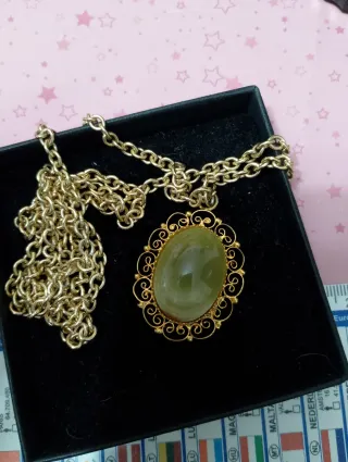 Collana con ciondolo onice dorato