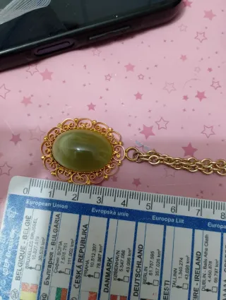 Collana con ciondolo onice dorato