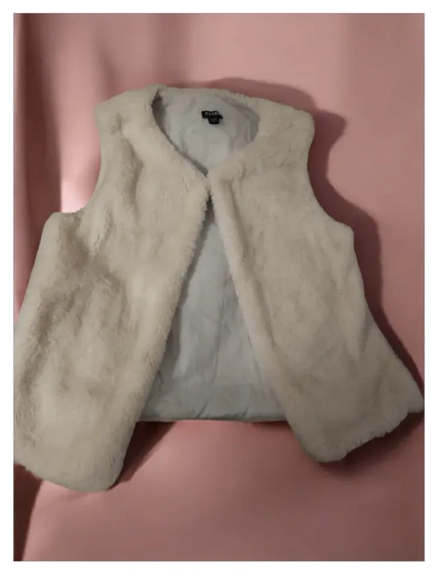 Chaqueta sin mangas de pelo para niña