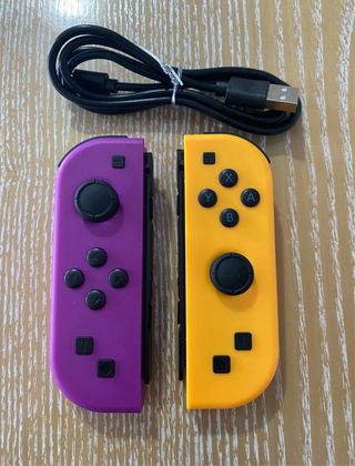 Joycons morado y naranja Nintendo Switch