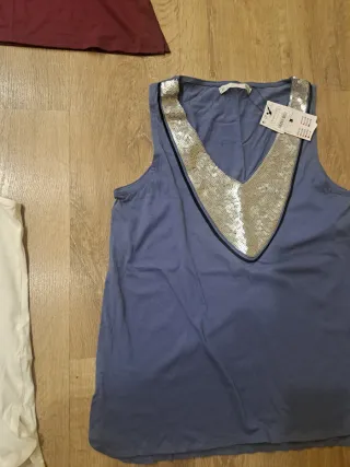 Camisetas con lentejuelas nuevas, talla L