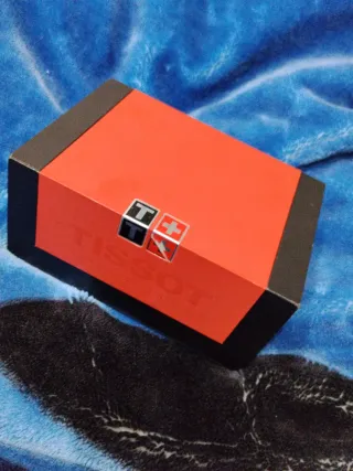 Caja Reloj Tissot + Libro La Novela de una Fábrica