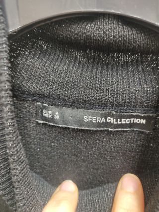 Jersey negro cuello alto con brillo