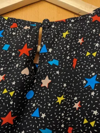 Vestido negro estampado estrellas manga larga