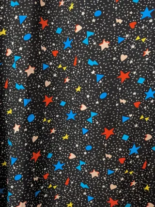 Vestido negro estampado estrellas manga larga