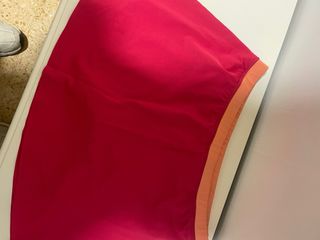 Falda deportiva Artengo roja y naranja