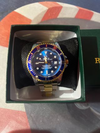 Reloj Rolex Submariner Azul y Dorado de Acero