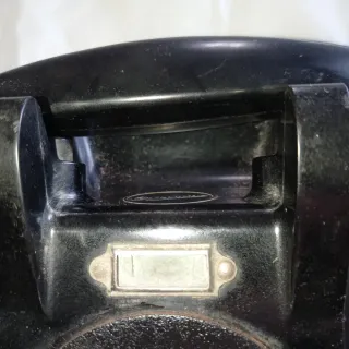 Teléfono negro antiguo pared timbres vistos