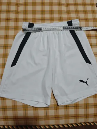 Conjunto deportivo Puma blanco y negro