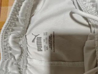 Conjunto deportivo Puma blanco y negro