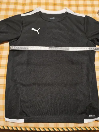 Conjunto deportivo Puma blanco y negro