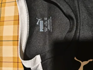 Conjunto deportivo Puma blanco y negro