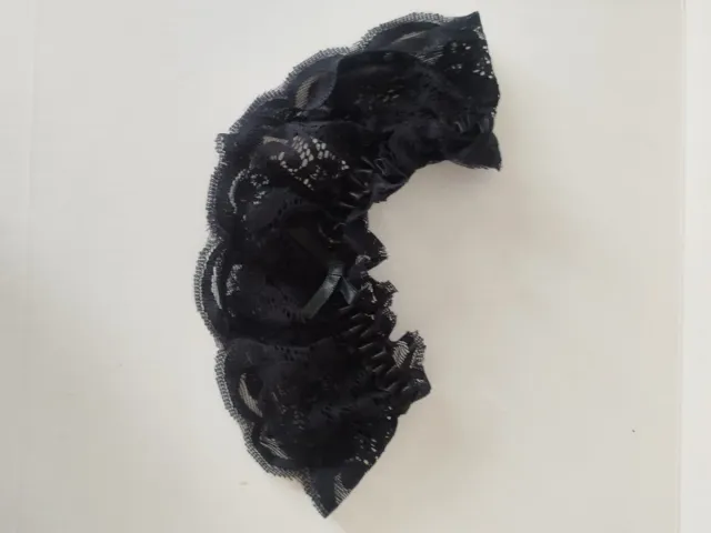 Salto de cama negro transparente con encaje