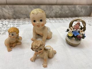 Figura bebé porcelana ángel