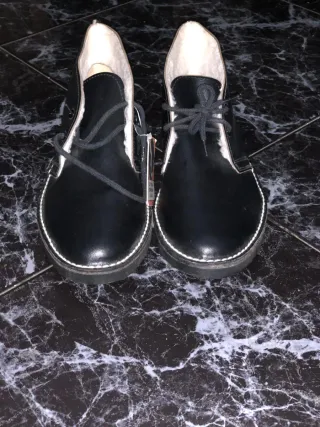 Botas negras con cordones y forro