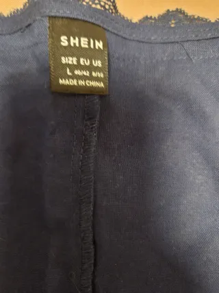 Blusa azul manga larga con encaje