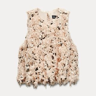 Top lentejuelas plumas