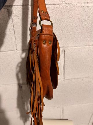 Bolso de piel con flecos